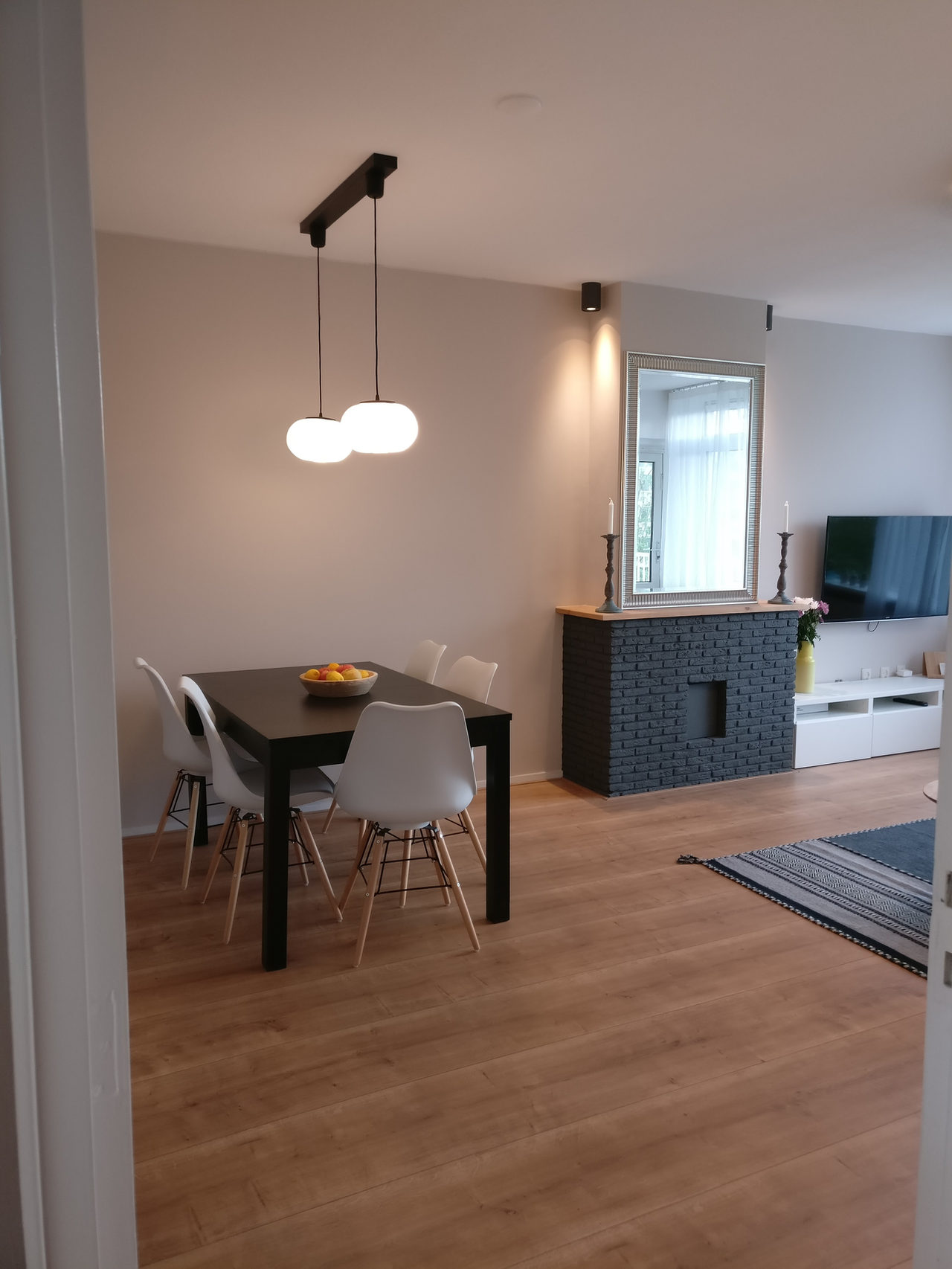 Black Brick Fireplace: rental property interior design in Amsterdam, photo 2 of 26